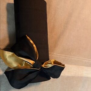 Estee Lauder Black and Gold Clutch